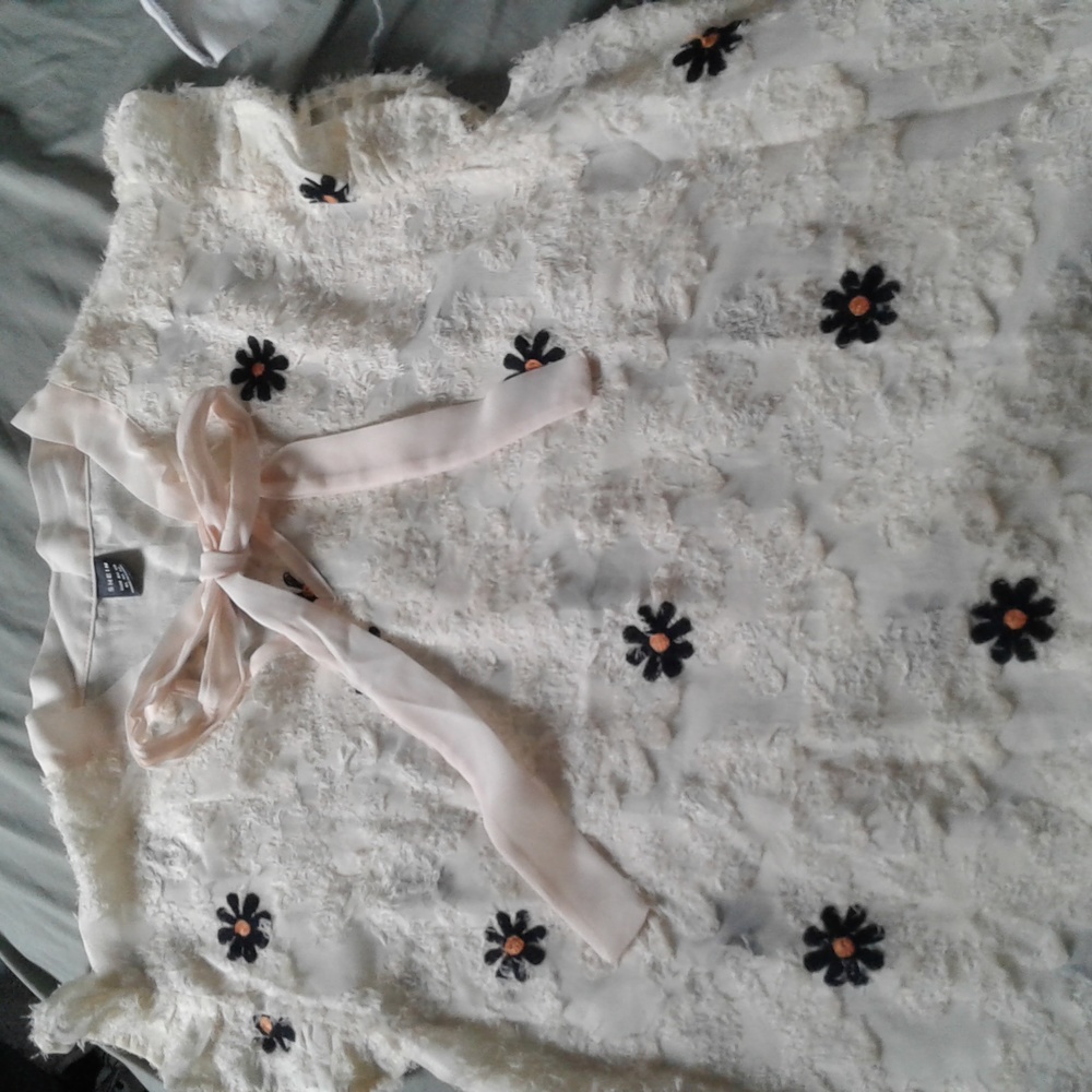 Cream flowered blouse